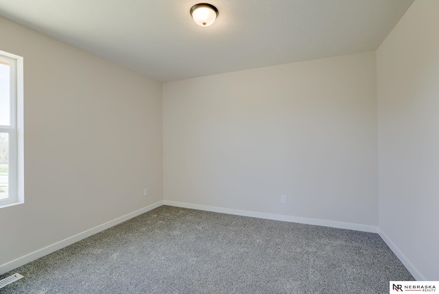 view of carpeted spare room