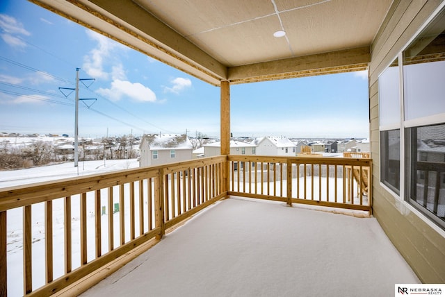 view of snow covered deck