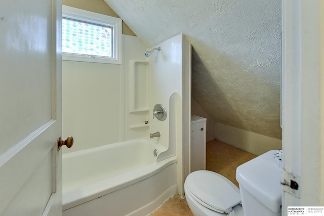 bathroom featuring toilet, bathtub / shower combination, and vaulted ceiling