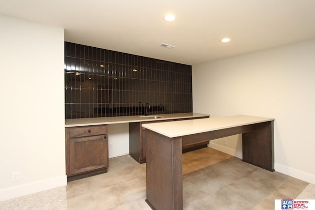 unfurnished office featuring sink