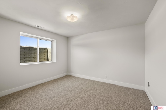 spare room with carpet flooring