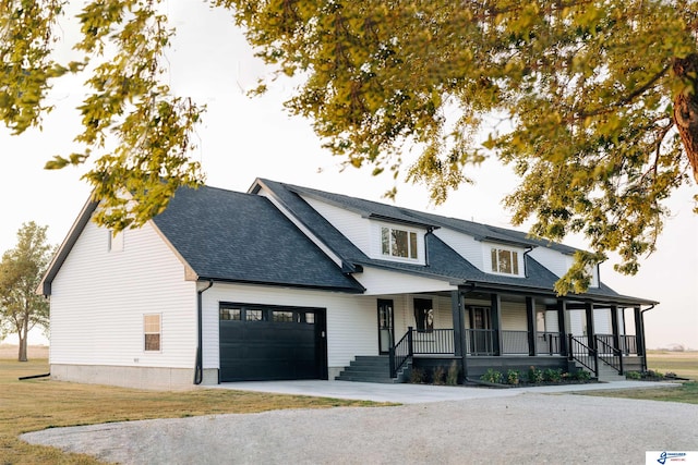 803 N 30th Rd, Syracuse, NE 68446 - modern inspired farmhouse featuring covered porch, an attached garage, driveway, a shingled roof, and a front yard