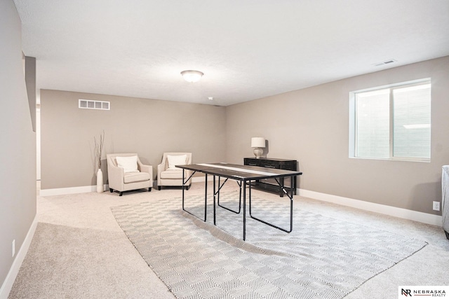 playroom featuring light colored carpet