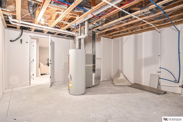 basement featuring heating unit and water heater