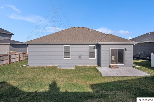 back of property featuring a patio area, a yard, and cooling unit