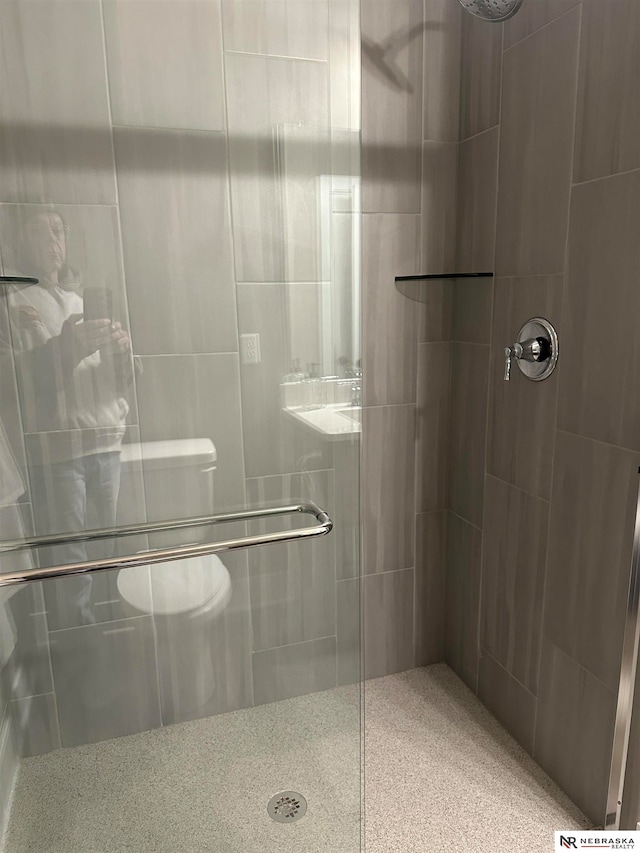 bathroom featuring an enclosed shower