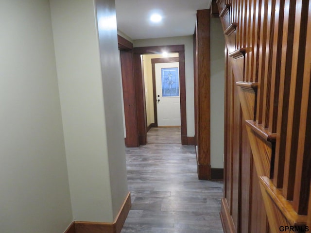 hallway featuring dark hardwood / wood-style flooring