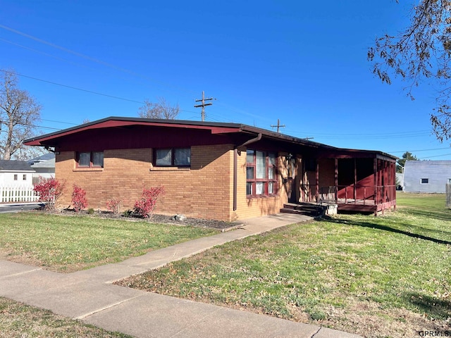 view of front of house with a front lawn