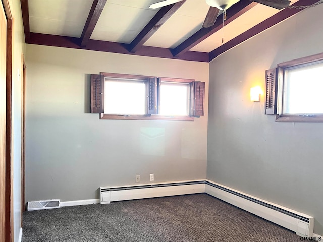 carpeted empty room with beamed ceiling, ceiling fan, a healthy amount of sunlight, and baseboard heating