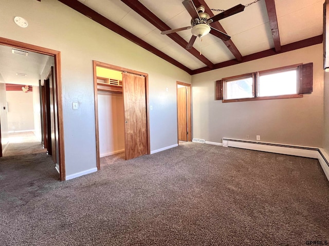 unfurnished bedroom featuring lofted ceiling with beams, a closet, dark carpet, and ceiling fan