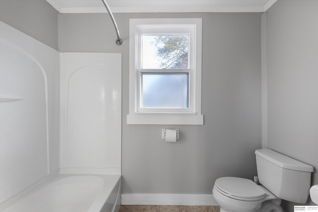 bathroom featuring tile patterned floors, shower / bathtub combination, toilet, and crown molding