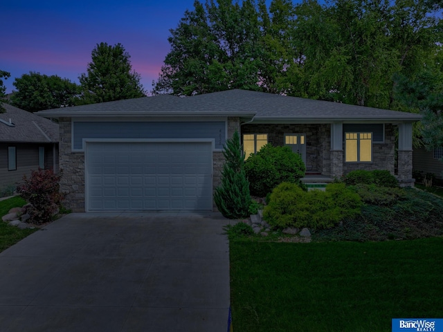 view of front of property featuring a garage