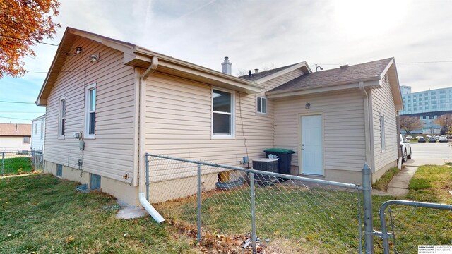 view of home's exterior featuring a yard