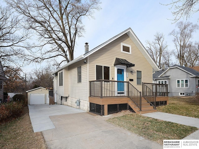 view of front of house featuring an outbuilding and a garage