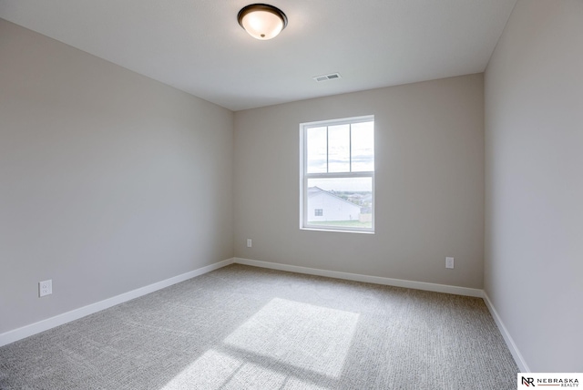 view of carpeted spare room