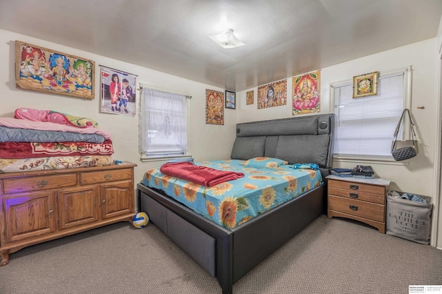 bedroom featuring carpet flooring