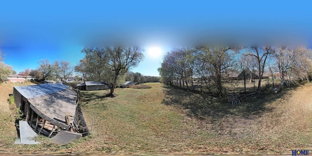 view of yard with a rural view