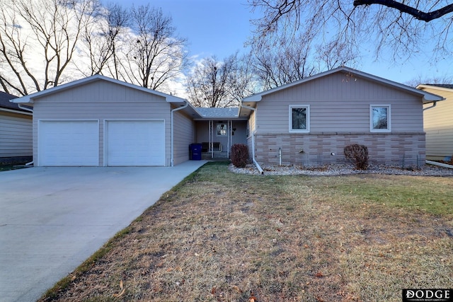 single story home with a garage and a front yard