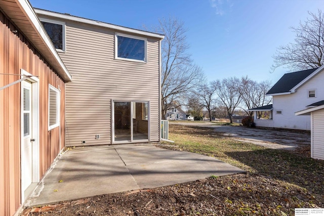 rear view of house featuring a patio