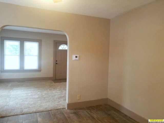 foyer featuring wood-type flooring