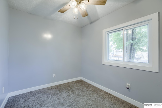 unfurnished room featuring carpet flooring, a textured ceiling, and ceiling fan