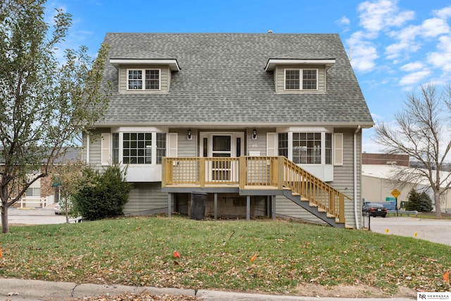 view of front facade featuring a front yard