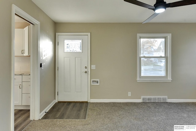 entryway with hardwood / wood-style flooring and ceiling fan