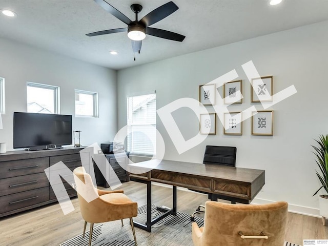 home office featuring ceiling fan and light wood-type flooring