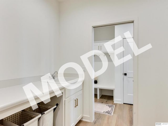 bathroom featuring hardwood / wood-style flooring