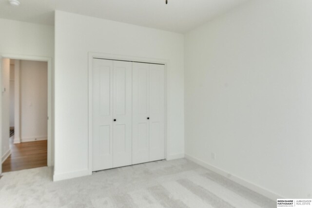6614 S 200th Ave, Omaha, NE 68135 - bathroom featuring wood finished floors and vanity
