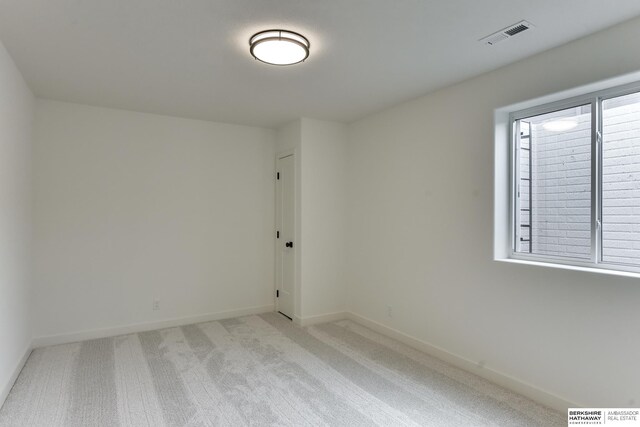 6614 S 200th Ave, Omaha, NE 68135 - carpeted empty room with baseboards