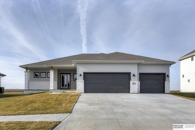 6614 S 200th Ave, Omaha, NE 68135 - full bathroom with wood finished floors, a shower stall, vanity, and toilet