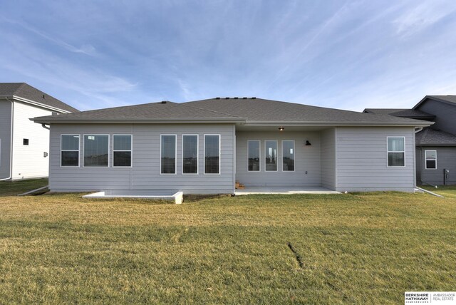 6614 S 200th Ave, Omaha, NE 68135 - rear view of house with a lawn and a patio