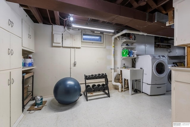 basement featuring washer and dryer