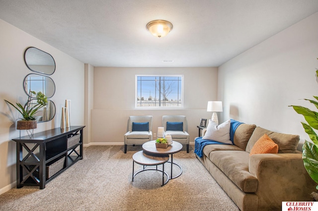 living room with a textured ceiling and light colored carpet