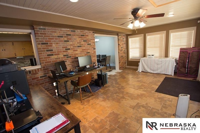 bedroom featuring crown molding, brick wall, and ceiling fan