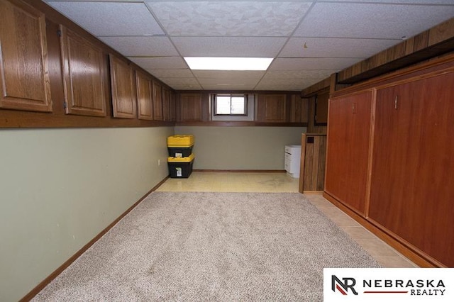 interior space featuring a paneled ceiling