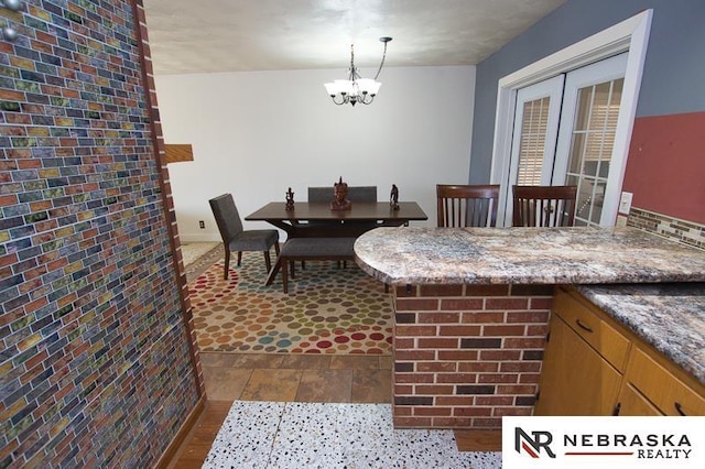 dining area featuring a chandelier