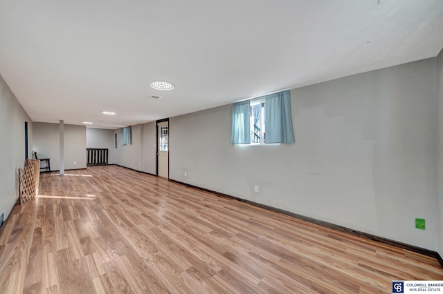 basement featuring light hardwood / wood-style flooring