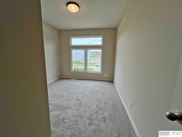 view of carpeted spare room