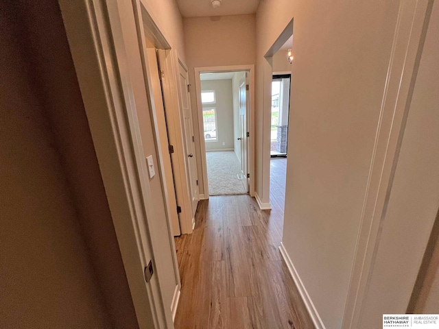 hallway featuring light hardwood / wood-style floors