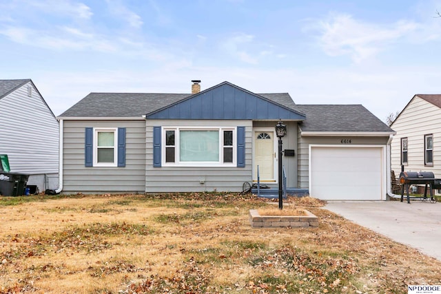 single story home featuring a garage