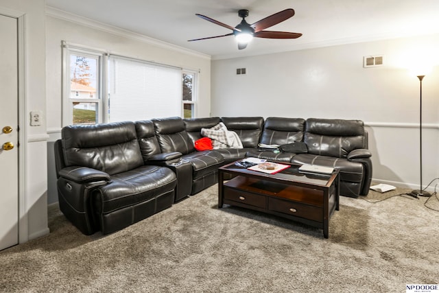 living room with carpet floors, ceiling fan, and ornamental molding