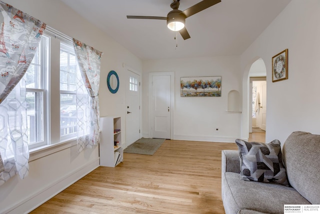 foyer featuring light hardwood / wood-style flooring and ceiling fan