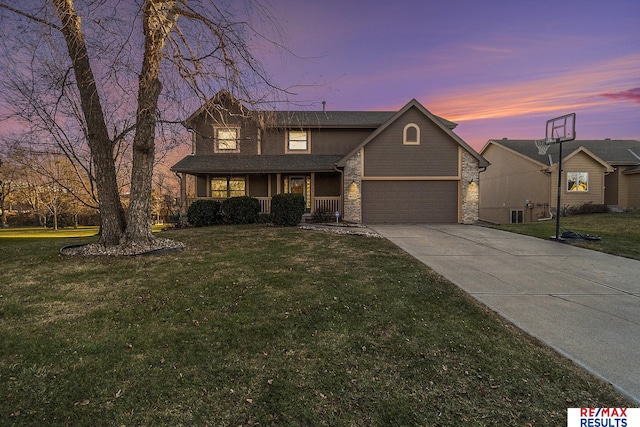 view of front of property featuring a lawn and a porch