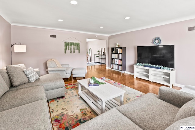 living room with hardwood / wood-style flooring