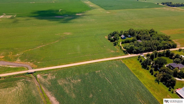 birds eye view of property featuring a rural view