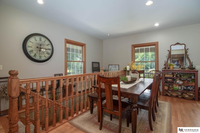 dining area with hardwood / wood-style floors