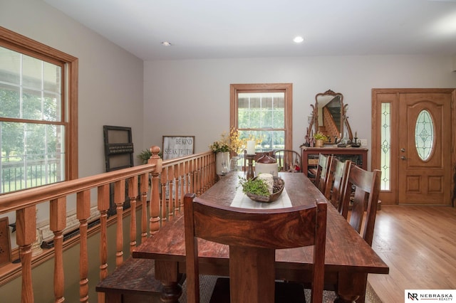 dining space featuring light hardwood / wood-style floors