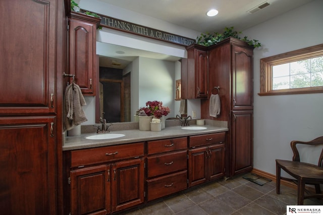 bathroom featuring vanity